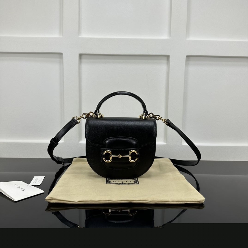 G*u*i top handle bags